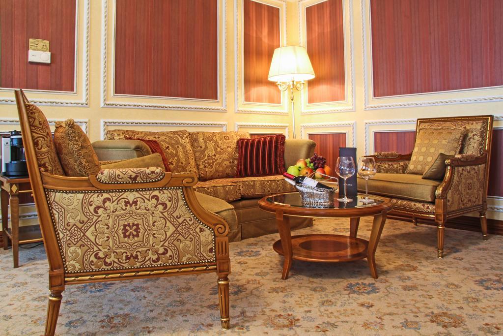 Golden Ring Hotel Moscow Exterior photo A living room in a suite at the Ritz-Carlton, Moscow